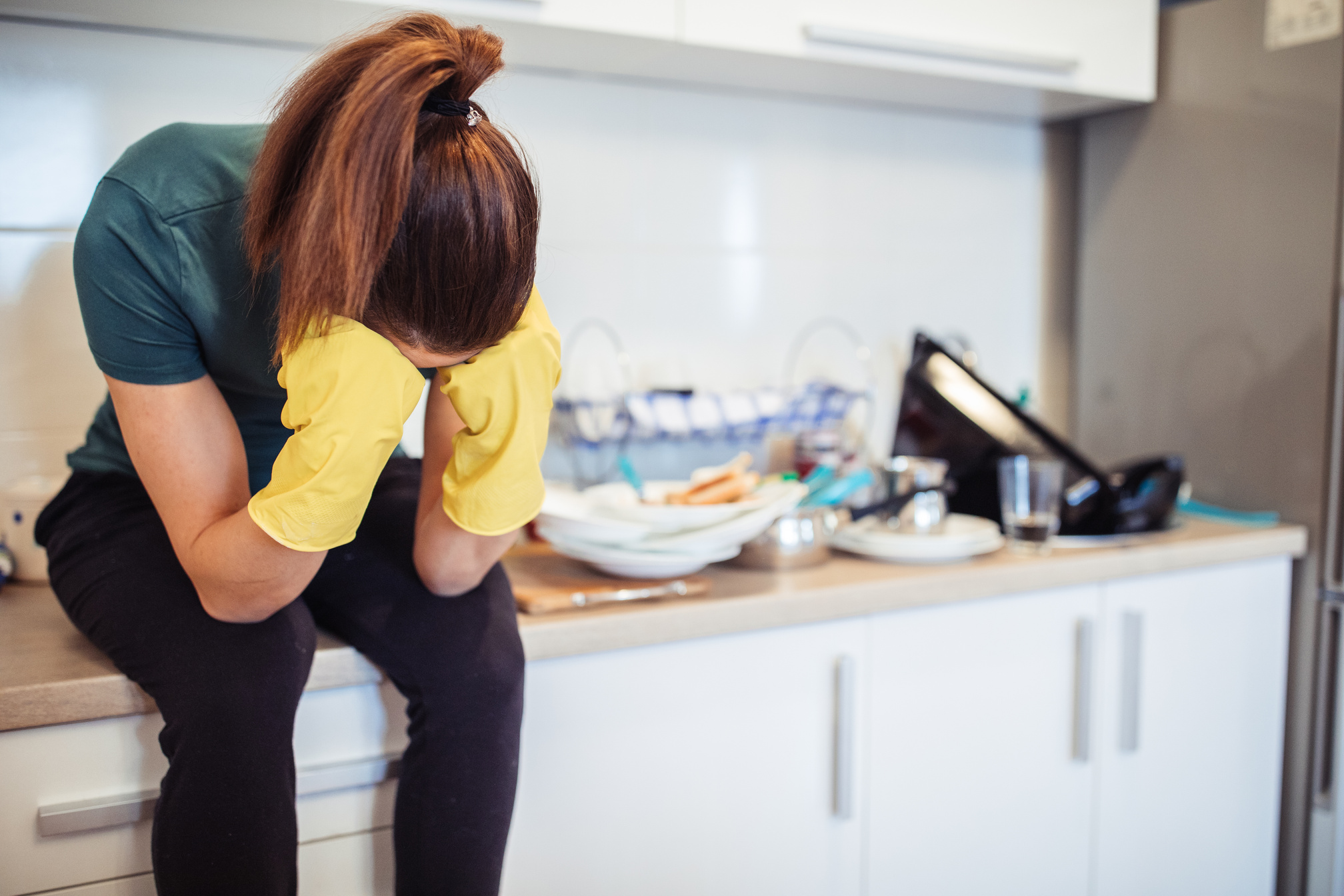 Stressed woman tired from cleaning